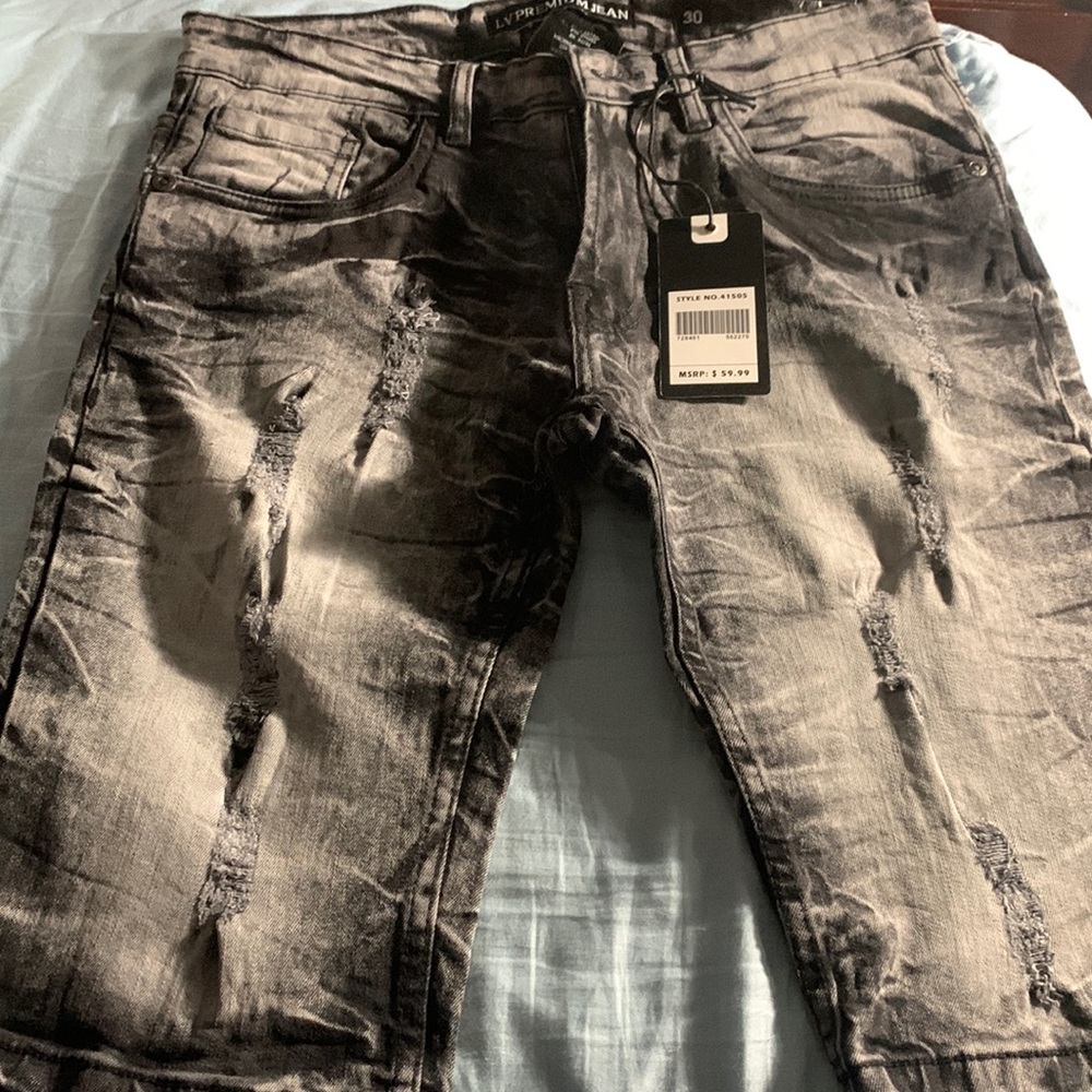 New shorts size 30waist black and gray in color.